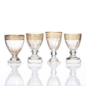 A set of Russian glasses (13 pcs.) and a bottle with stopper, 19th Century.