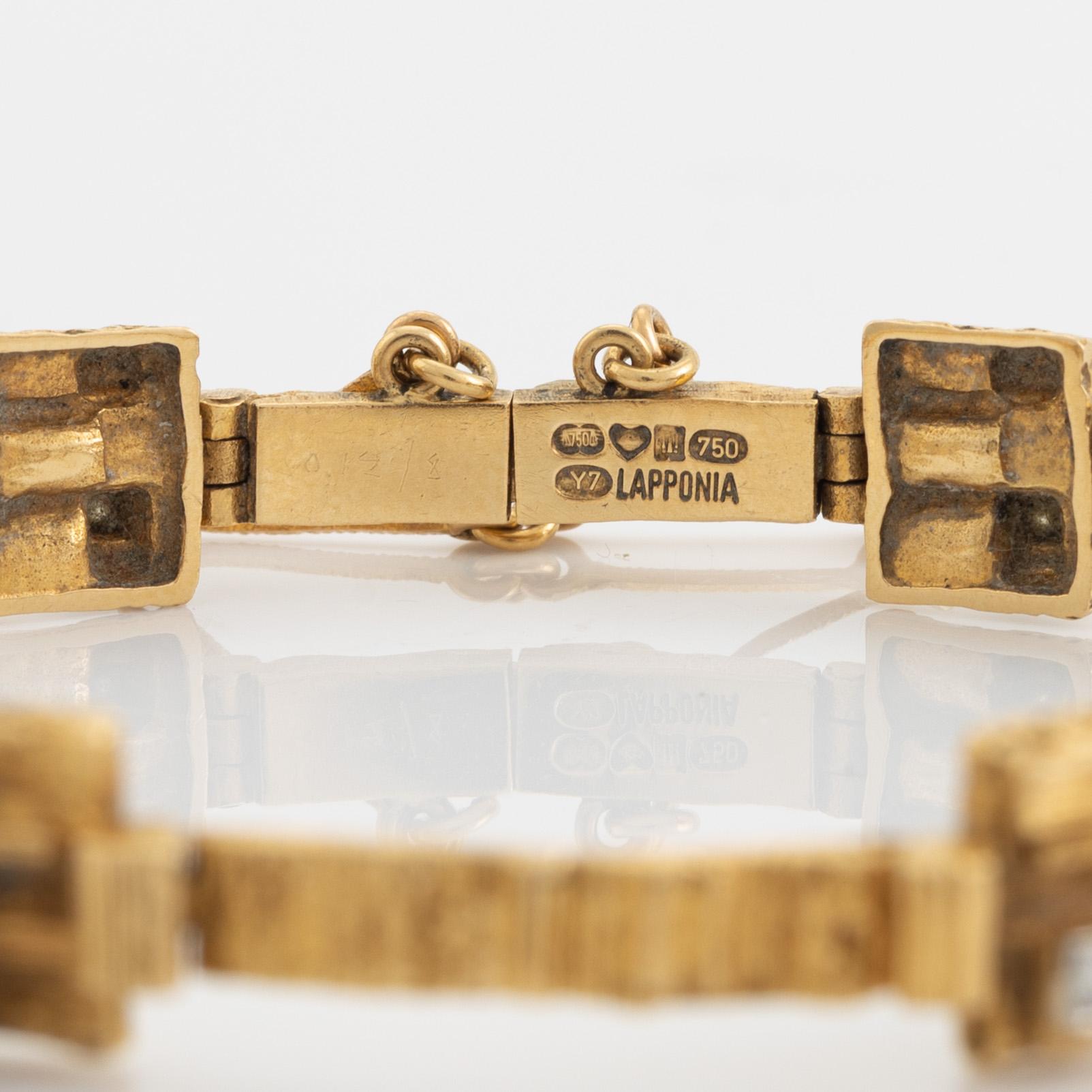 Björn Weckström, 18K gold and eight cut diamond "Diamantetapper" bracelet.