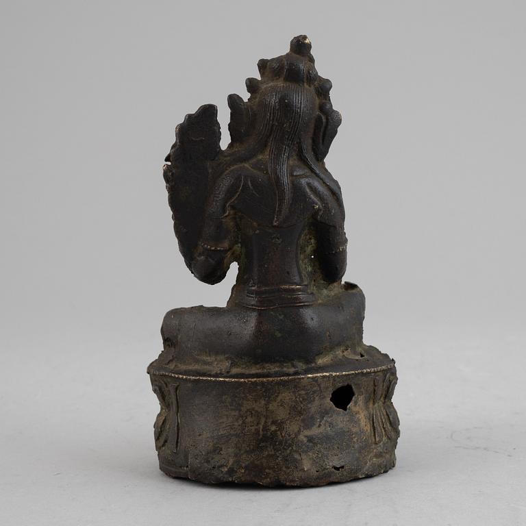 A Sino-Tibetan bronze figure of Green Tara, presumably 18th century.