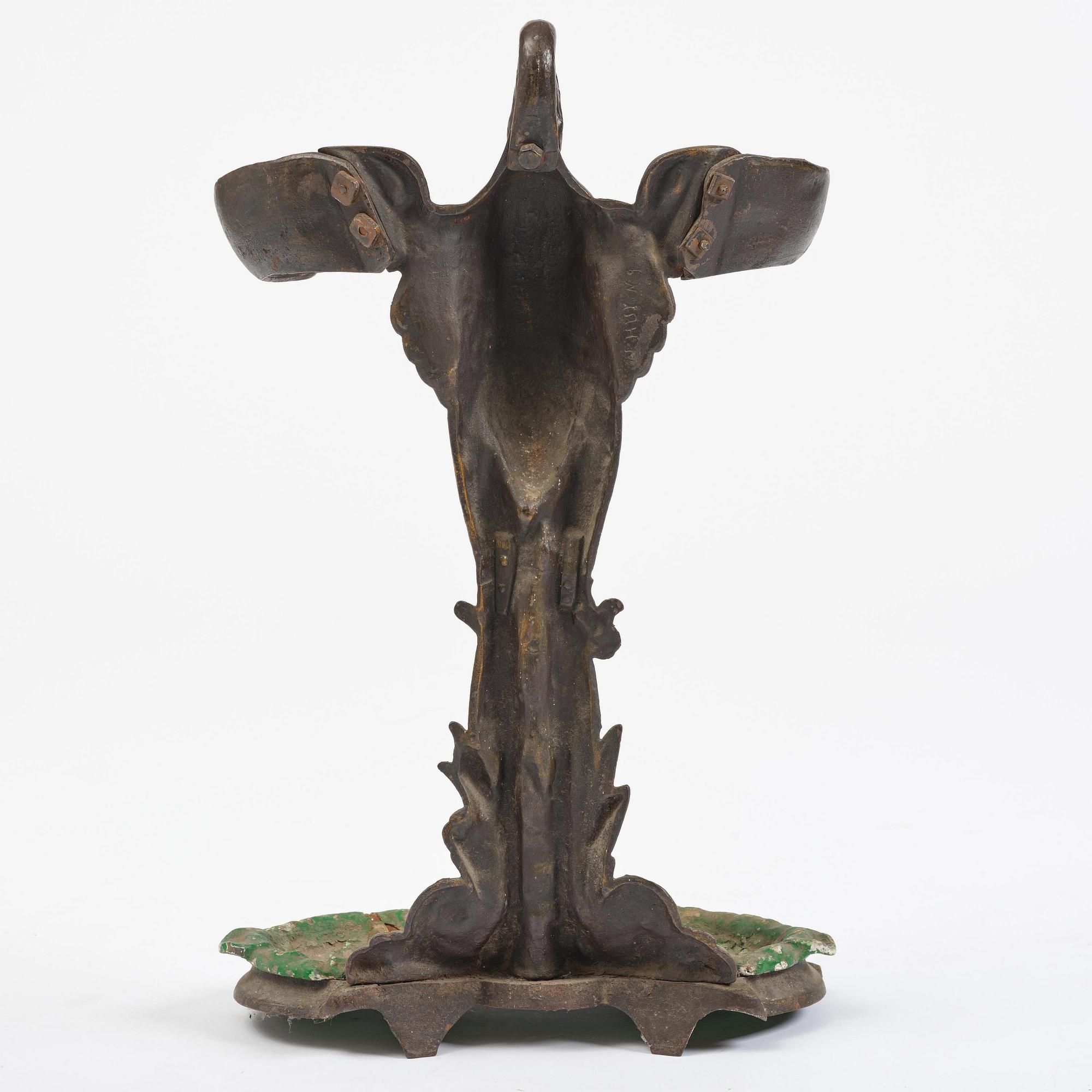 A French cast-iron umbrella stand, late 19th century.