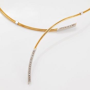 An 18K gold and white gold necklace set with round brilliant-cut diamonds.