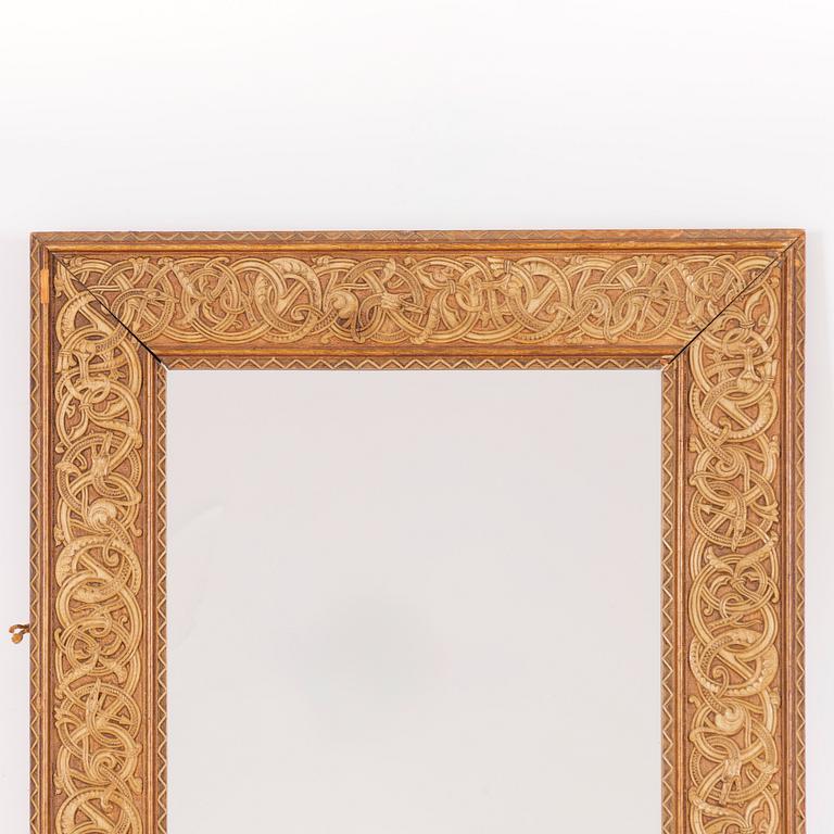 Mirror in ancient Nordic style, circa 1900.