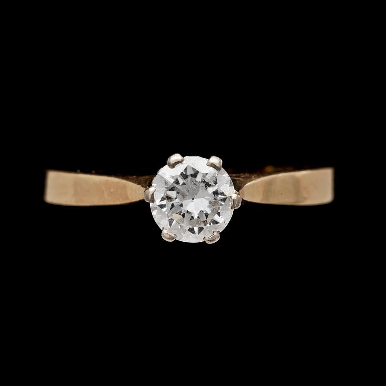 RING, 18k guld med briljantslipad diamant, 0.54 ct enl gravyr, Stockholm, 1984.