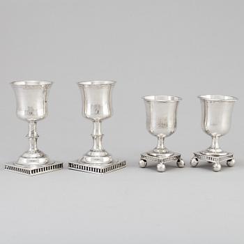 Four 19th century, silver goblets.