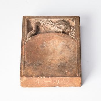 A Chinese ink stone with an inscription, Qing dynasty or older.