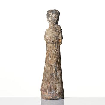 A pottery figure of a lady, Han dynasty (220 BC-206 AD).