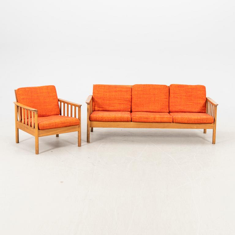 An oak easy chair ans sofa "Tiveden" by Gunnar Myrstrand & Sven Engström from the middle of the 20th century.