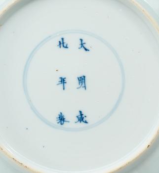 A set of four blue and white dishes, Qing dynasty, Kangxi (1662-1722), with Chenghua six character mark.