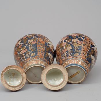 A pair of Japanese imari jars with covers, Edo Period (1603-1868).