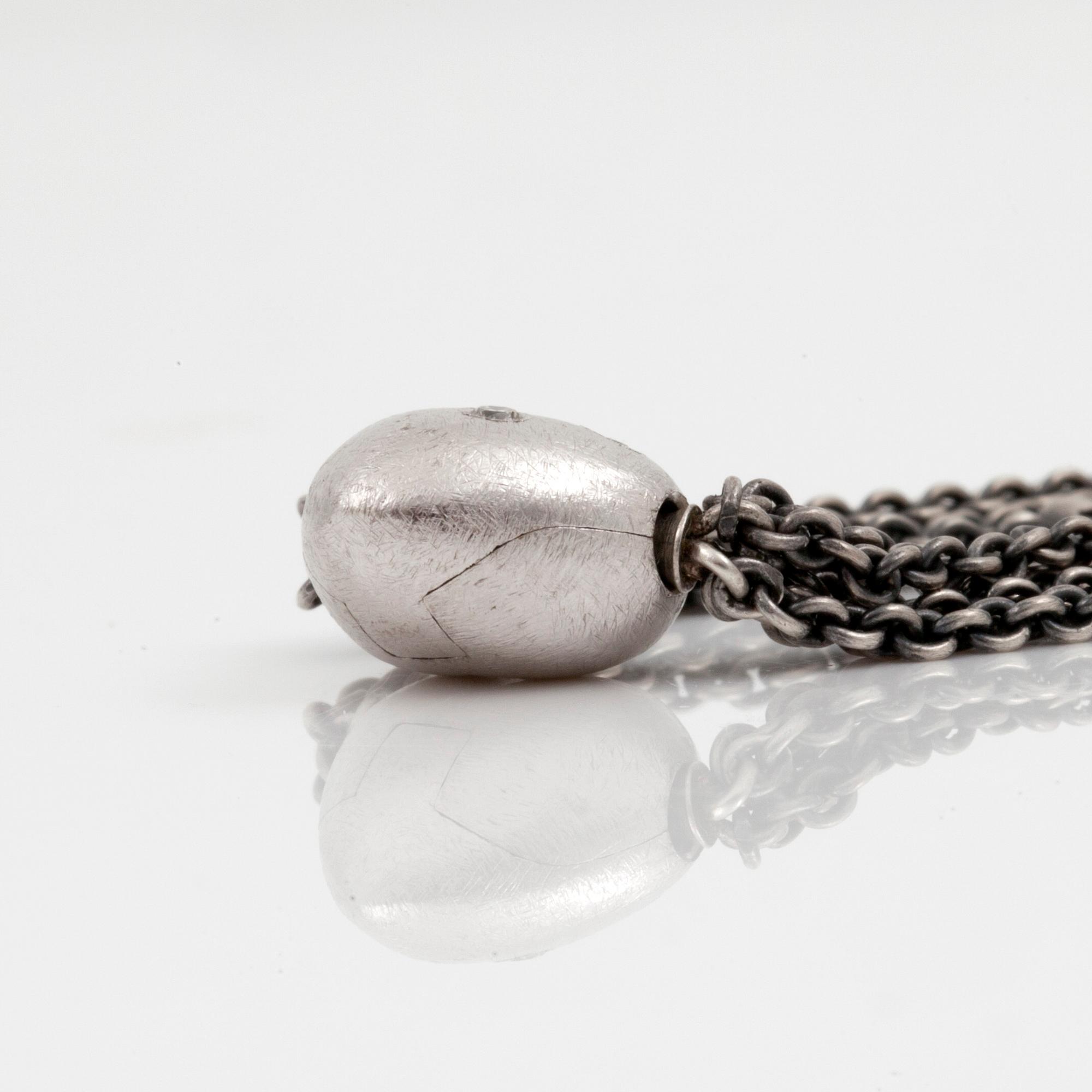 COLLIER, Ole Lynggaard, femradig oxiderad silverlänk, med lås i form av ett hjärta med diamanter.