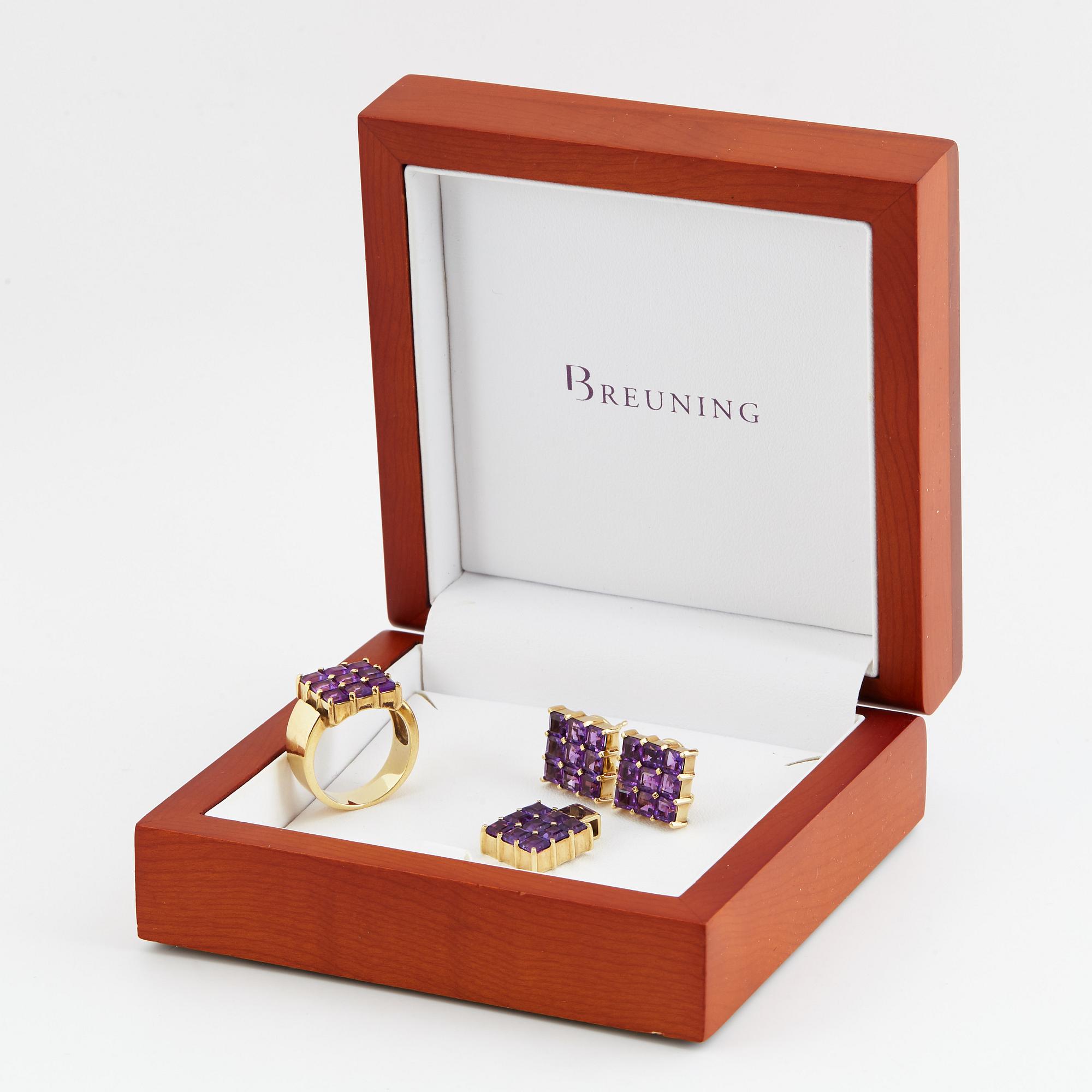 Breuning, a pair of earrings, a pendant and a ring.