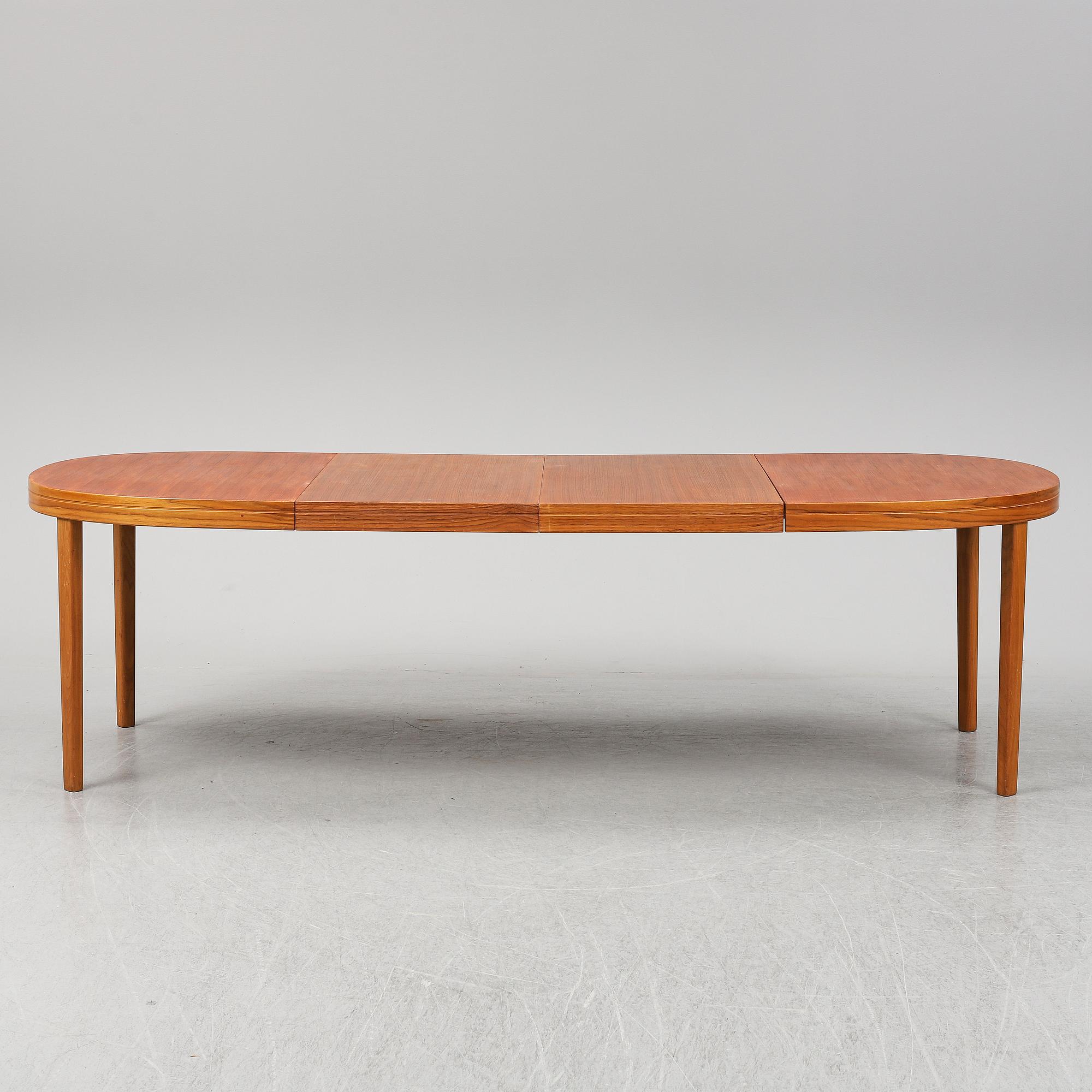 A walnut dining table from Skaraborgs Möbelindustri AB, Tibro, second half of the 20th Century.