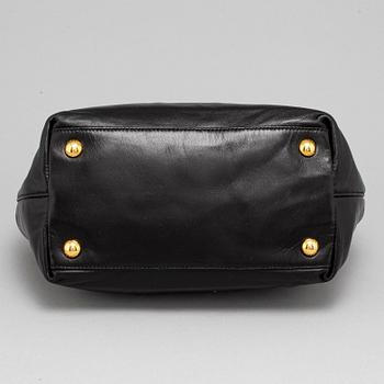 PRADA, black leather bag.