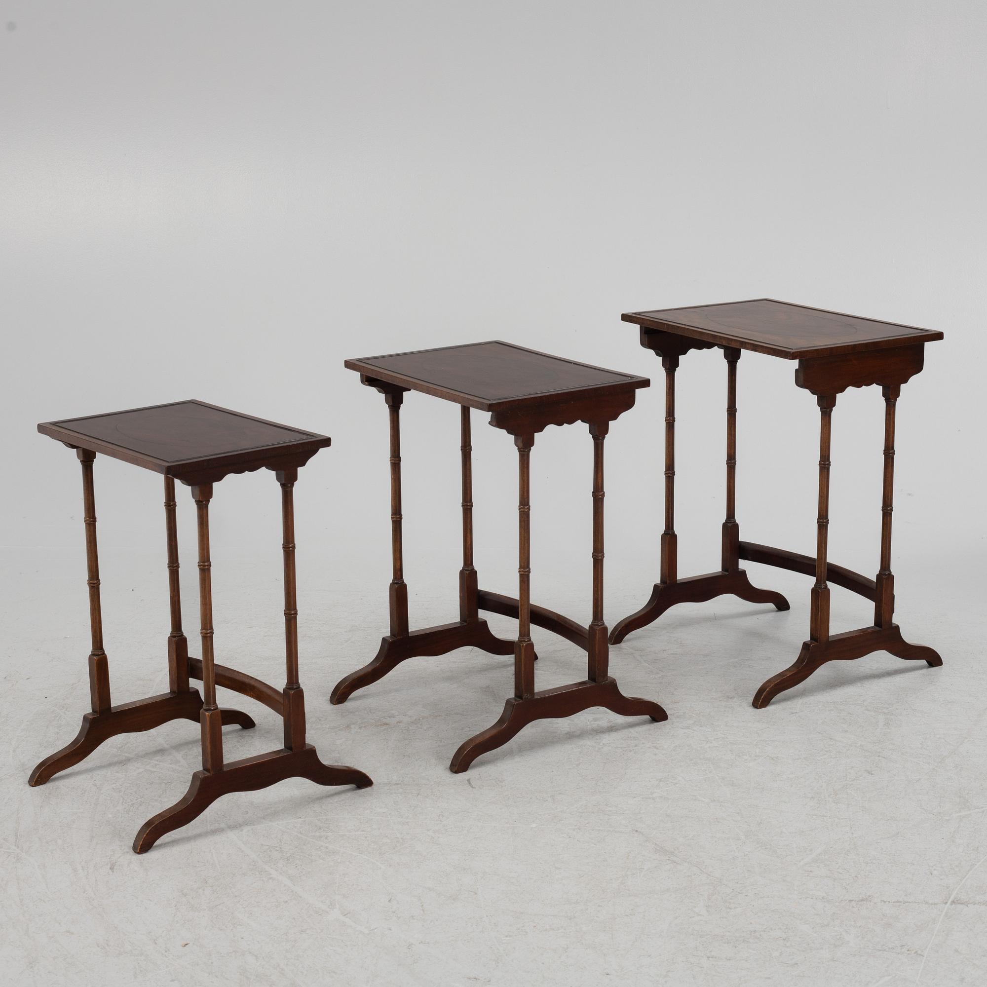 Three-piece nest of tables, mid-20th century.