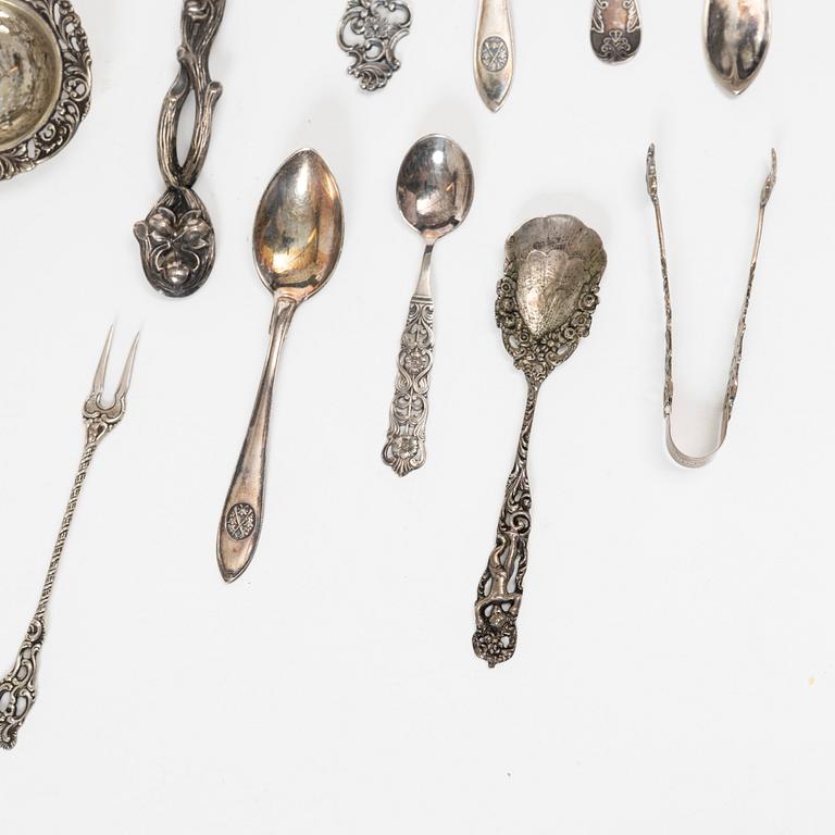 A set of silver cutlery and napkin rings, including with mark of Th Marthinsen, Tönsberg, Norway (14 pieces).