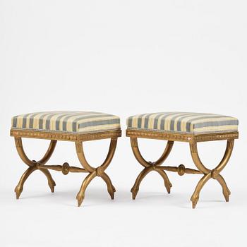 A pair of late Gustavian stools attributed to E. Ståhl (master in Stockholm 1794-1820).