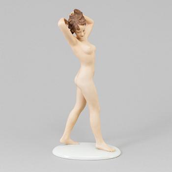 A porcelain figurine by Schaubach Kunst, Germany, first half of the 20th century.