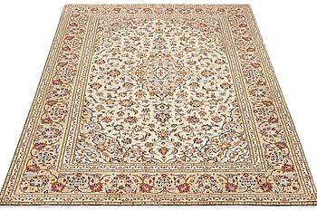 A Keshan carpet, c. 295 x 197 cm.