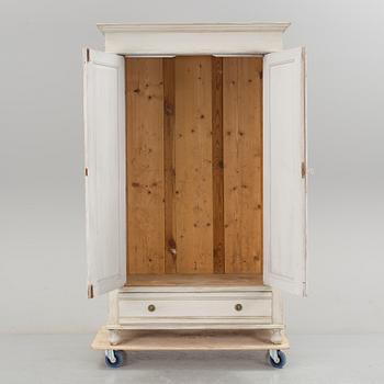 A wardrobe, circa 1900.