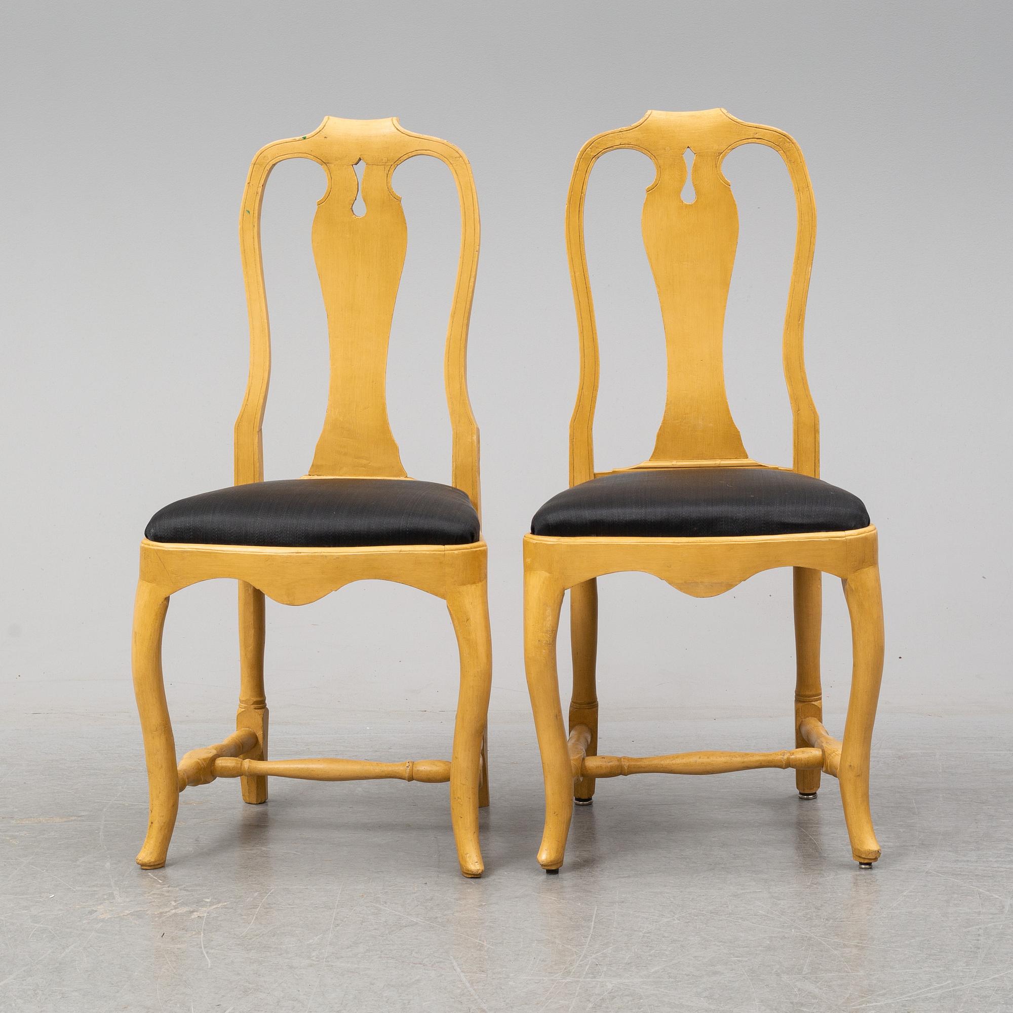 A mid 18th Century pair of rococo chairs.