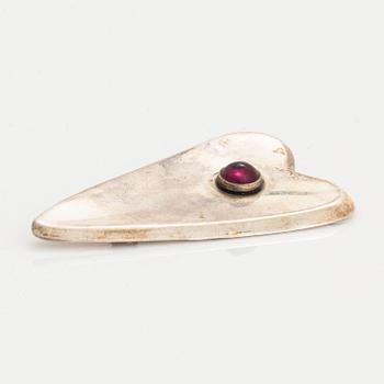 Alton silver and cabochon-cut amethyst brooch.