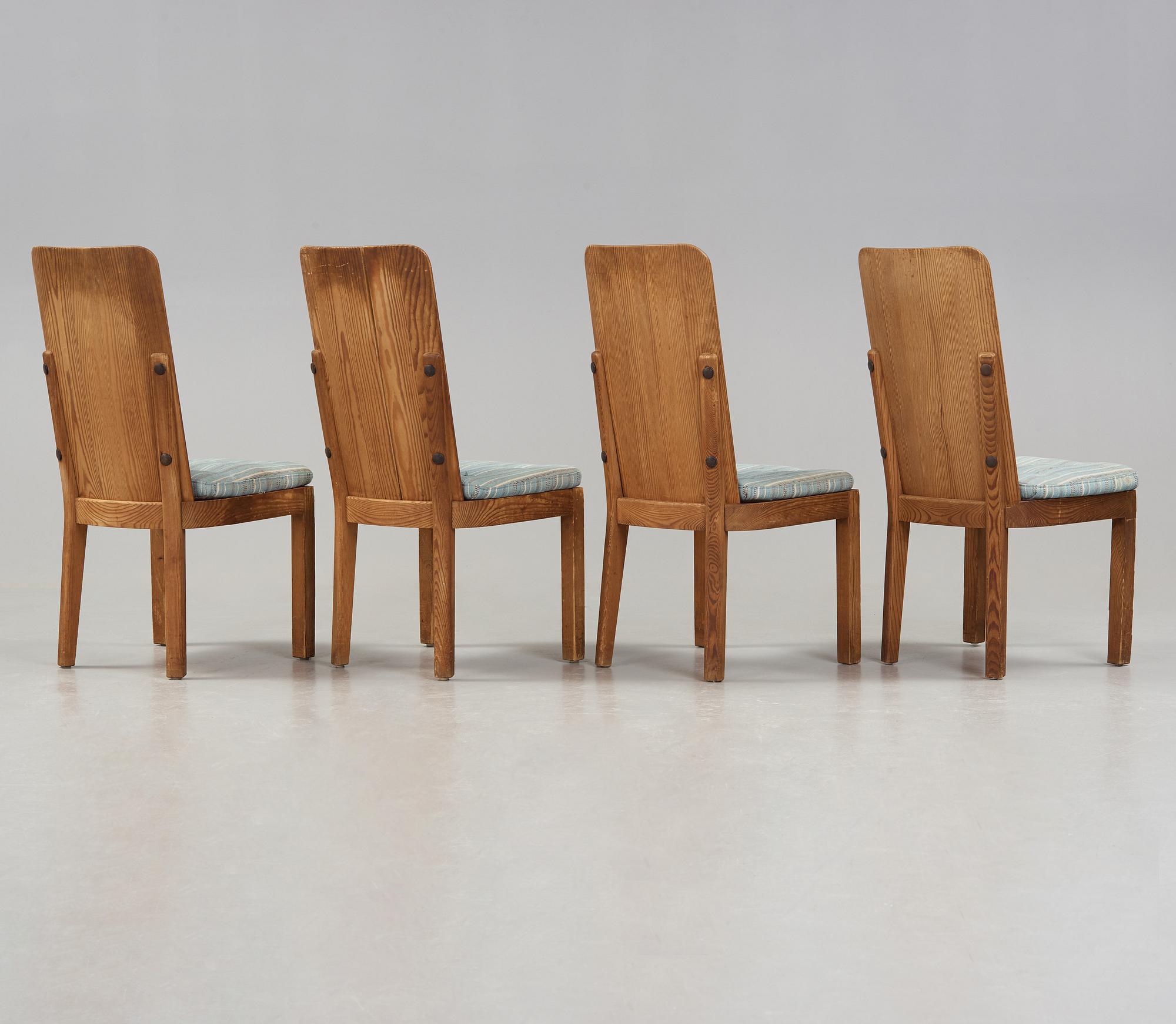 A set of four Axel Einar Hjorth stained pine 'Lovö' chairs, Nordiska Kompaniet, Sweden 1930's.