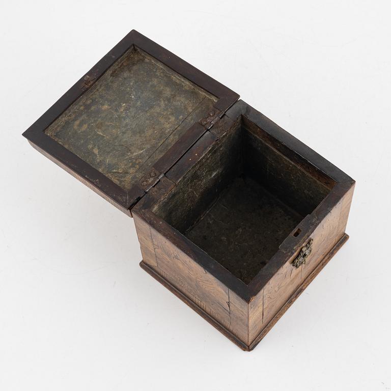 A Swedish rococo elm tea caddy, later part of the 18th century.