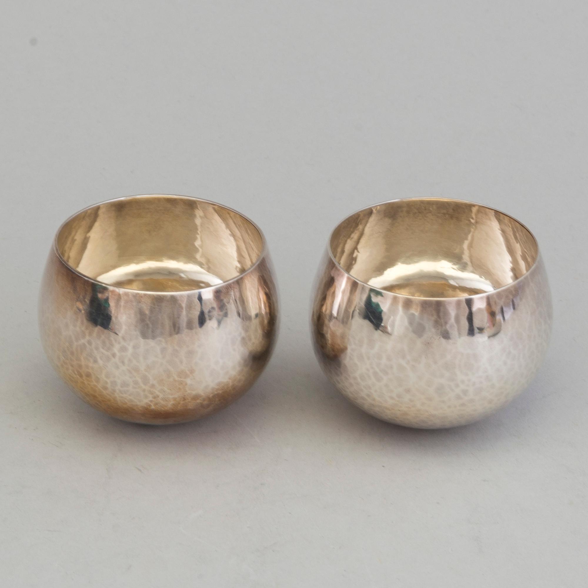 a pair of sterling silver cups by Karl-Axel Karlsson Stockholm 1989.