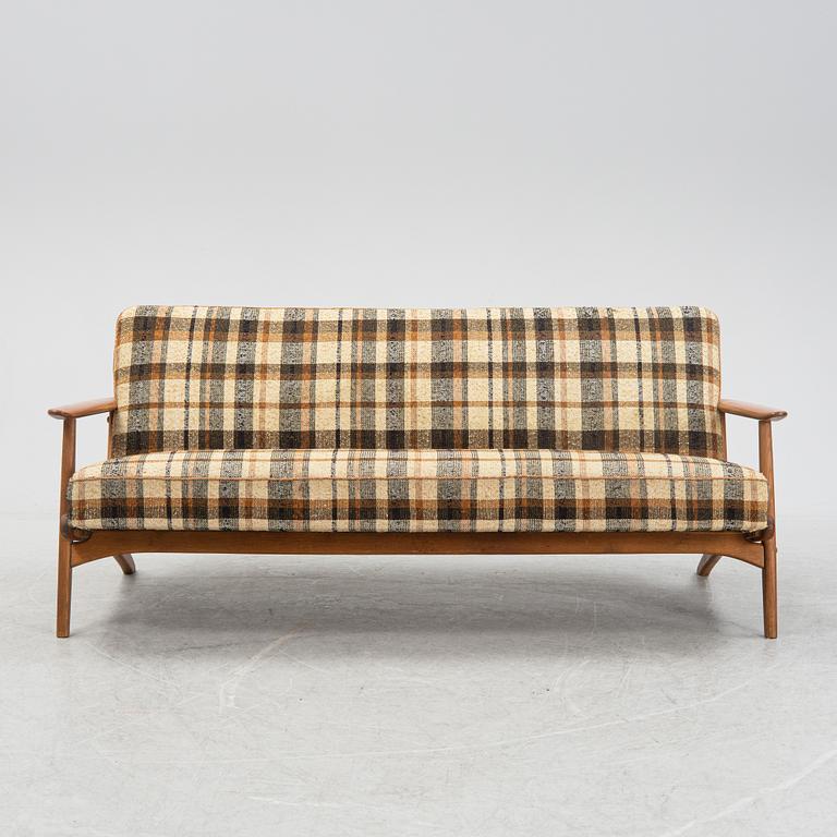 A teak sofa, mid 20th Century.
