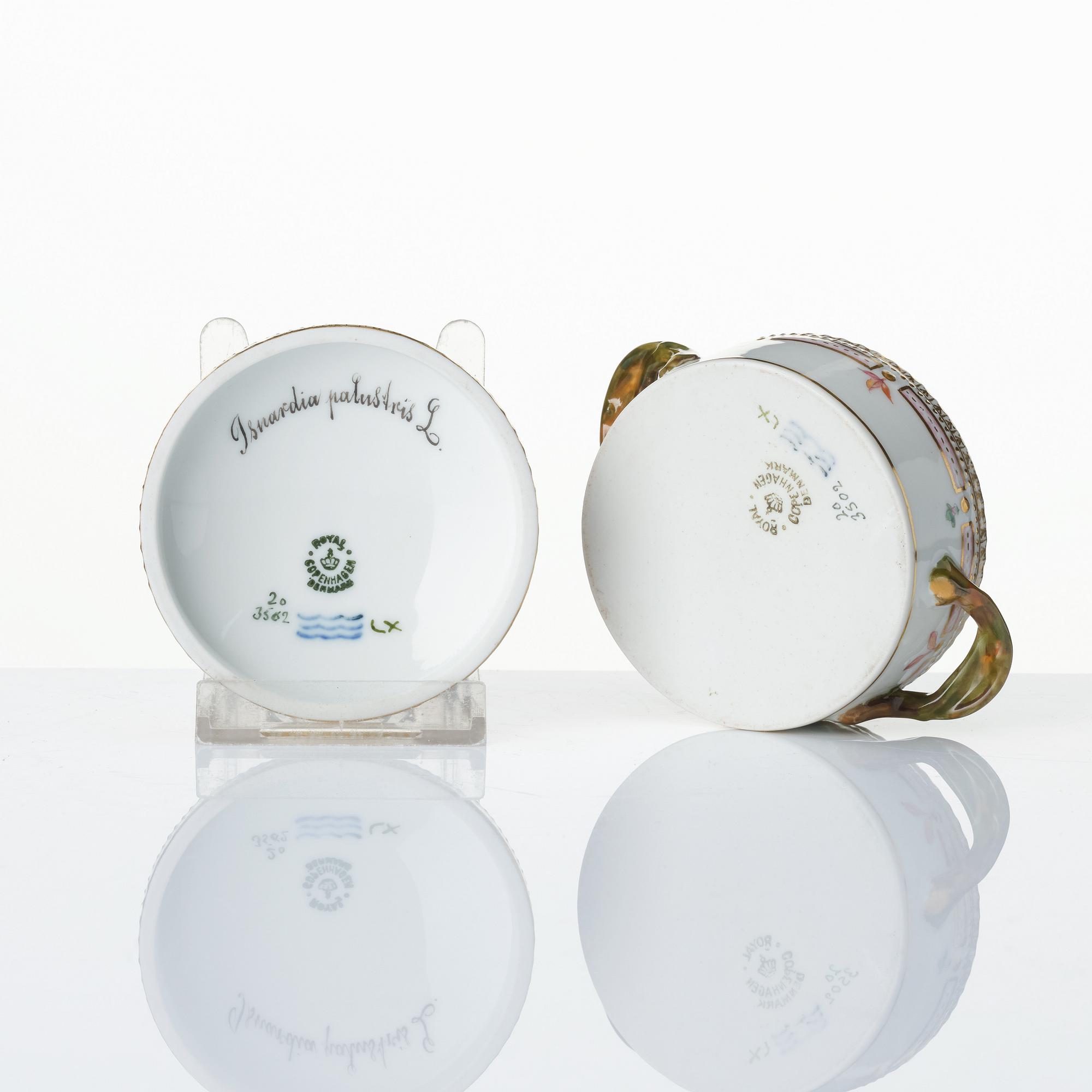 A set with a Royal Copenhagen 'Flora Danica' triangular dish, a sugar bowl with cover and three small dishes, Denmark,