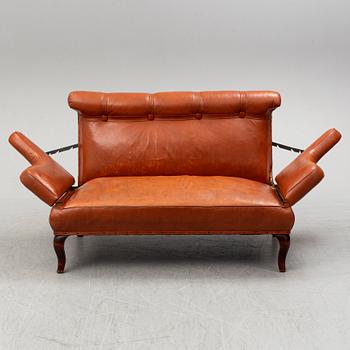 An early 20th century leather sofa.