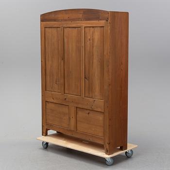 A stained pine bookcase attributed to Carl Westman, early 20th Century.