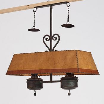 Nordiska Kompaniet, a patinated metal ceiling light for a Swedish "Sportstuge" interior, 1930's.