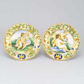 A large majolica 'istoriato' dish and two plates, 20th Century.