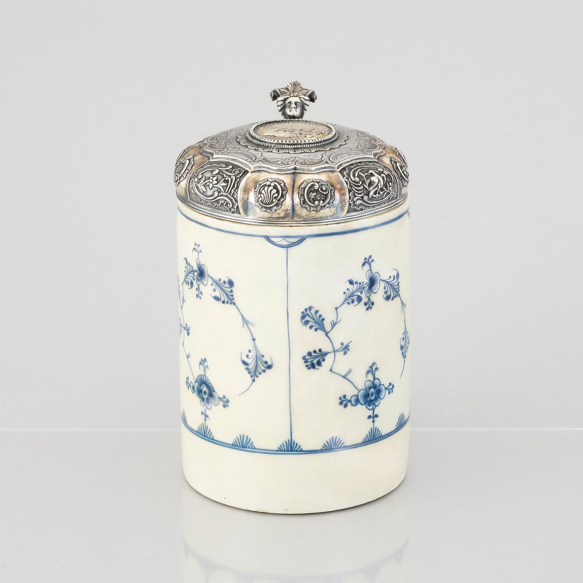 A Norwegin tankard with silver lid by Jens Jacob Bechmann, Skien 1780, porcelain Royal Copenhagen.