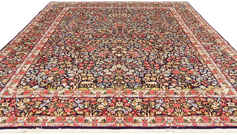 A pictoral 'Millefleur' Kerman carpet 390 x 298 cm.