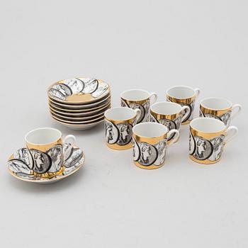 FORNASETTI, eight porcelian espresso cups and saucers from Milan, Italy.