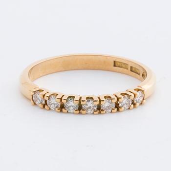 RING 18K gold w 7 brilliant-cut diamonds 0,21 ct engraved. Strömdahl Stockholm 1985.