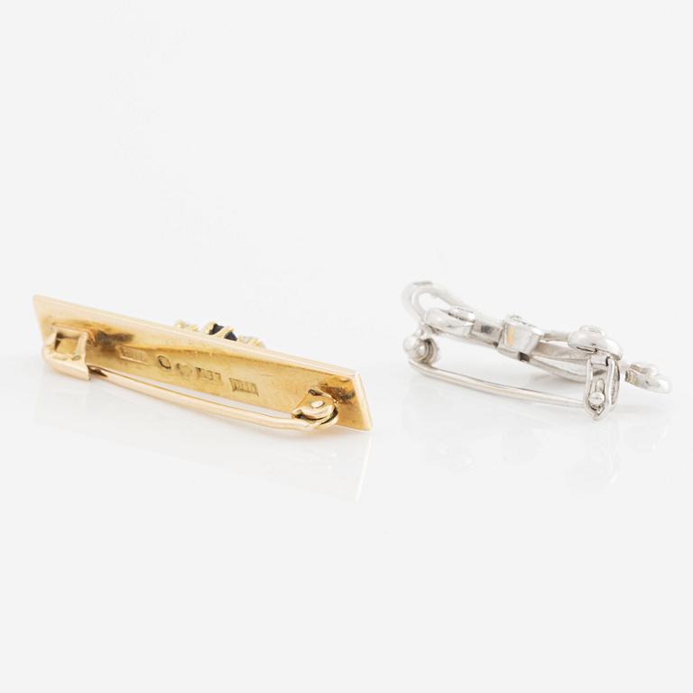Two brooches, platinum and 18K gold.