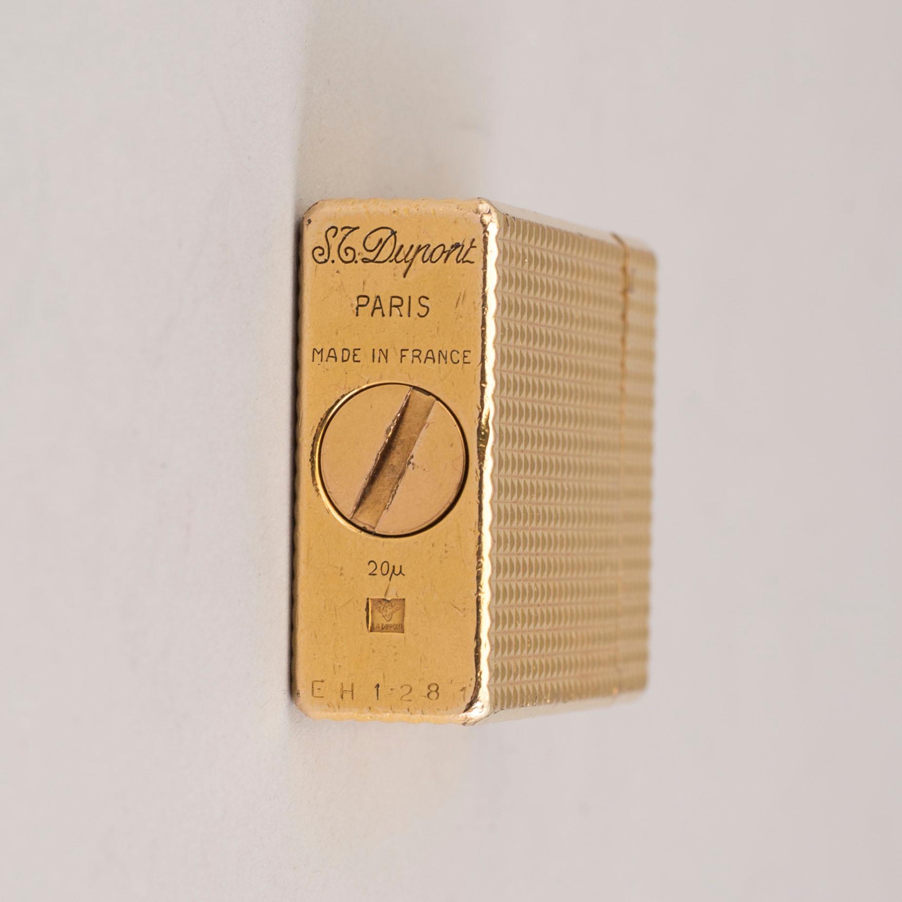 TÄNDARE, Dupont. Förgylld metall, 1900-talets andra hälft.