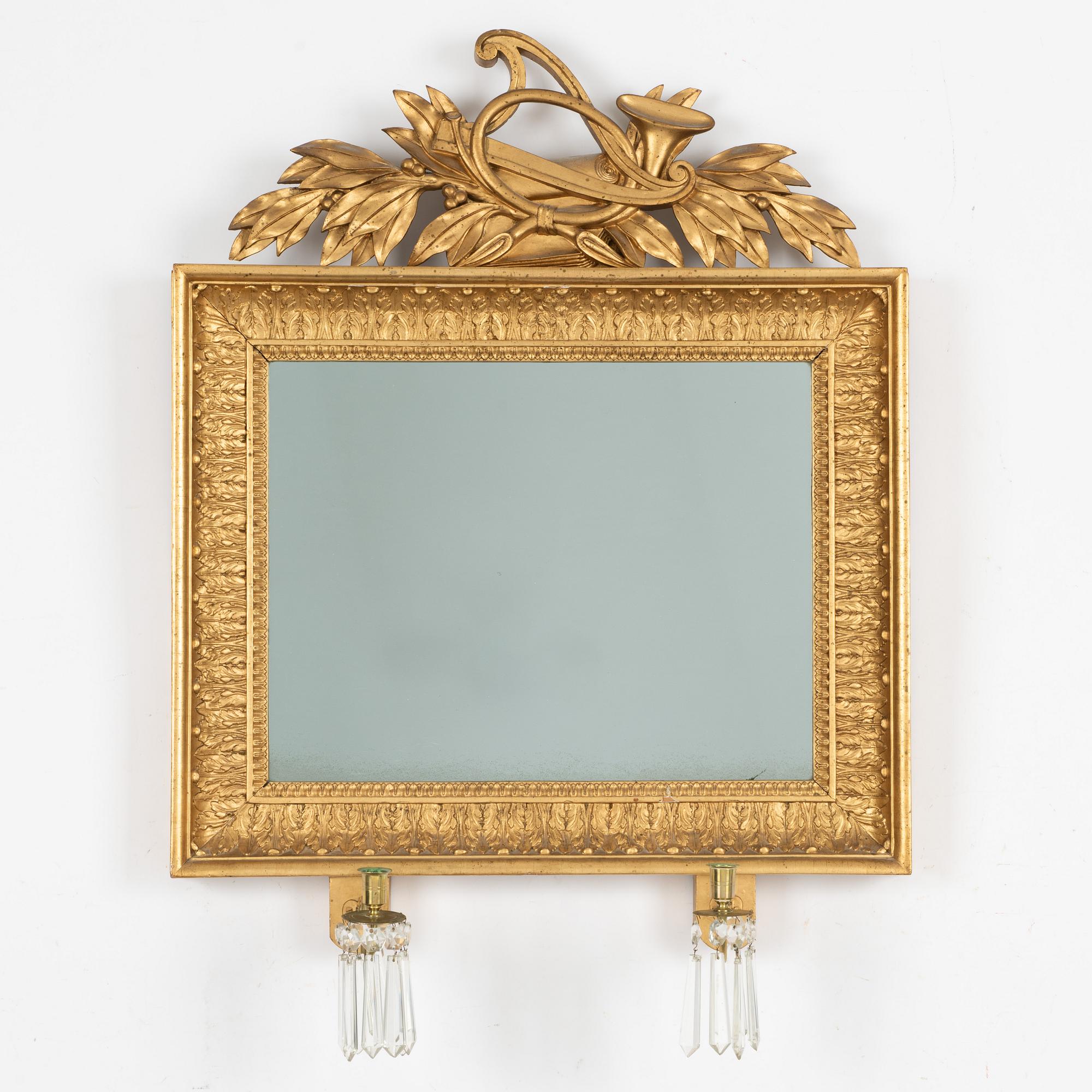 A mirrior wall sconce, 19th century.
