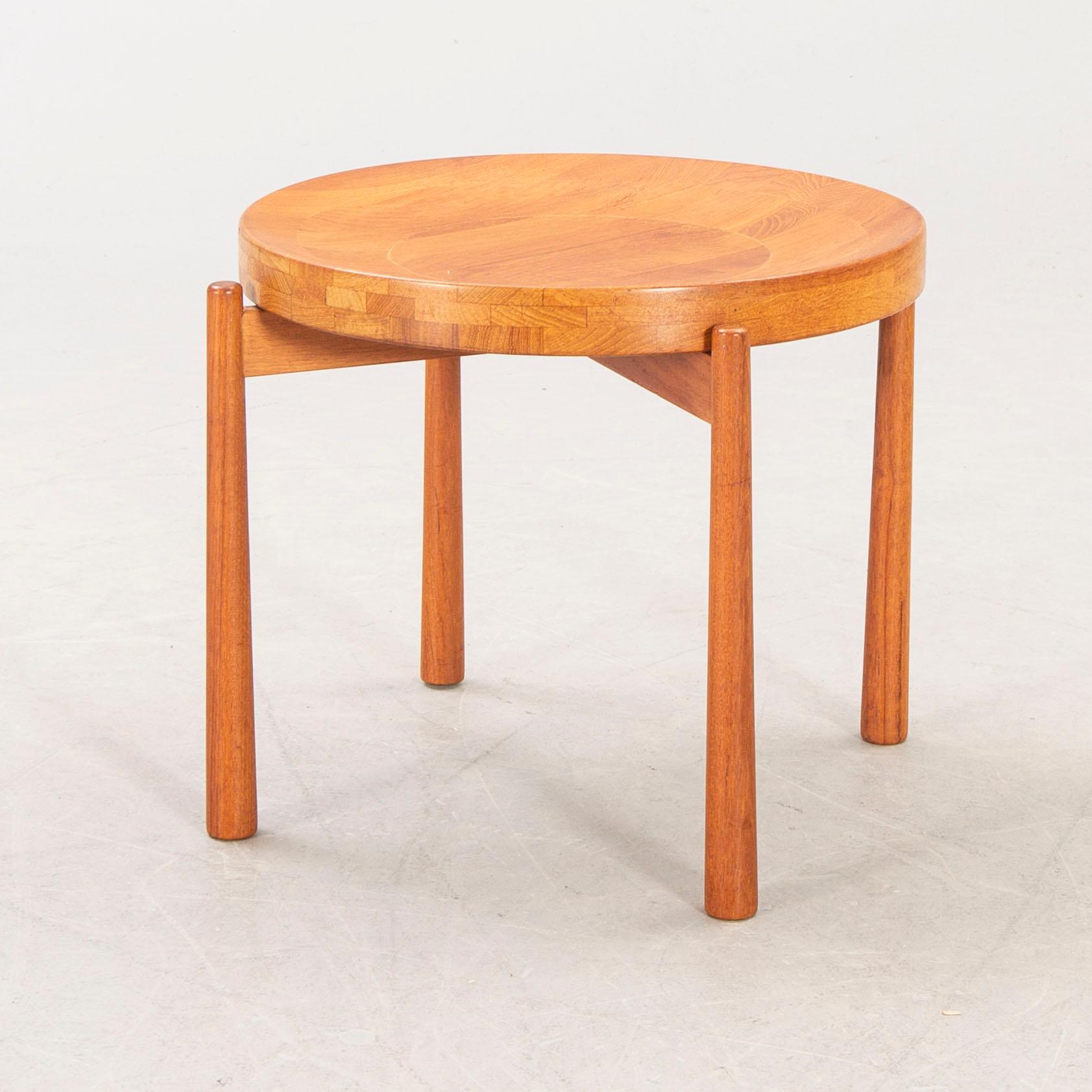 A Jens Quistgaard teak table mind 1900s.