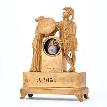 A French Empire early 19th century gilt bronze mantel clock.