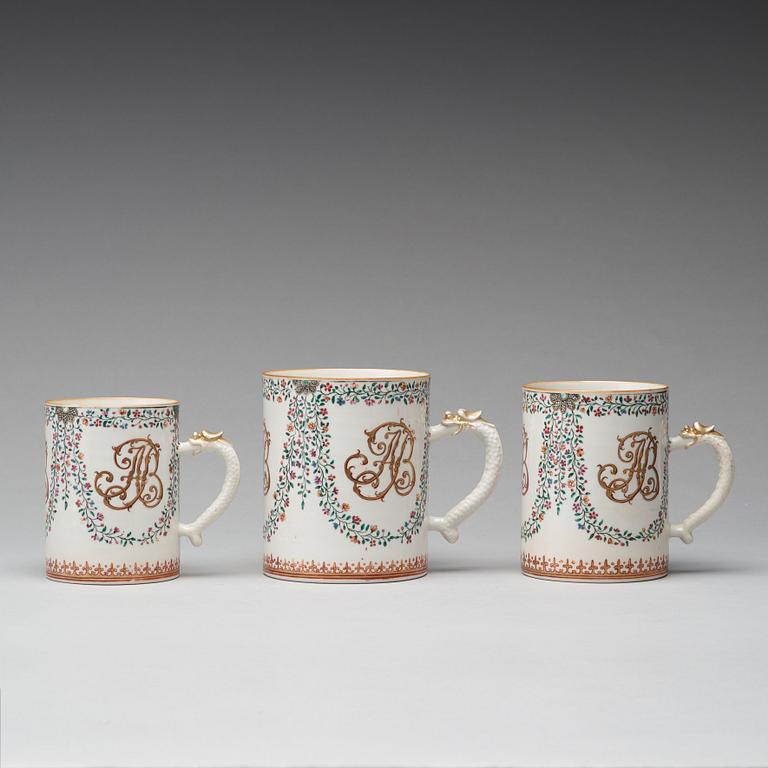 A group of three famille rose armorial jugs, Qing dynasty, Qianlong (1736-95).