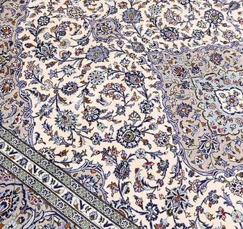 A Keshan carpet, approx. 343 x 253 cm.