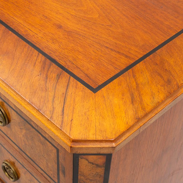 A chest of drawers, circa 1900.