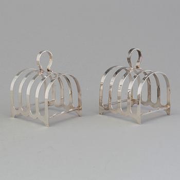 A pair of silver toast racks by Robert F. Mosley, Sheffield, England 1944.