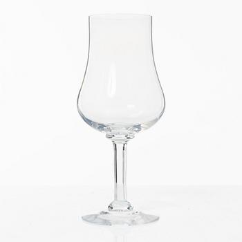 A set of 46 glass service parts, including 'Elixir Connoisseur' and Gunnar Cyrén, 'Optica', Orrefors.