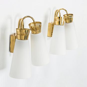 A pair of mid-20th century 'EY 60' wall lights for Itsu.