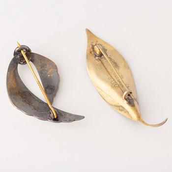 David Andersen, necklace and two brooches, silver and enamel.